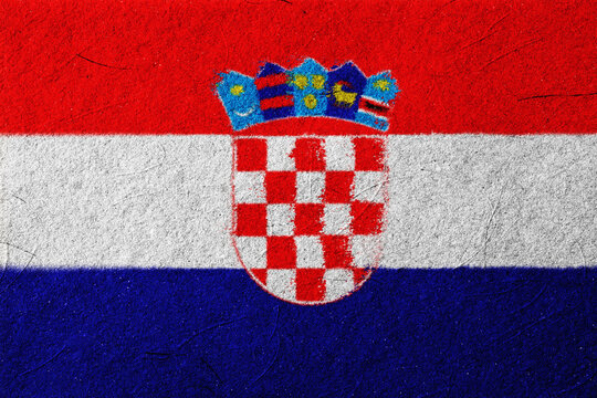 Textured rendition of the Croatian flag featuring a red, white, and blue horizontal tricolor and the coat of arms with a checkered shield, evoking a sense of national pride, and - Powered by Adobe