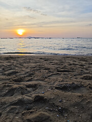 Sunset beach sea ocean sky sand wave horizon seascape tranquil sunset beach sea ocean sky sand wave horizon seascape tranquil view calm water golden light serene coastal landscape peaceful evening