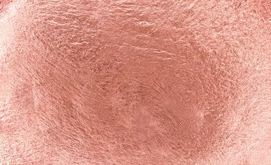 高級感ある背景 ローズゴールドやピンクシャンパンの光沢とシワのあるメタリックテクスチャーのデザイン素材