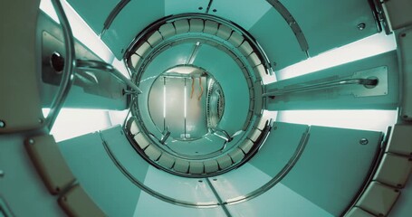 A futuristic transportation pod features sleek metallic interiors and illuminated surfaces. The cylindrical design invites curiosity, evoking a sense of adventure within an advanced setting.