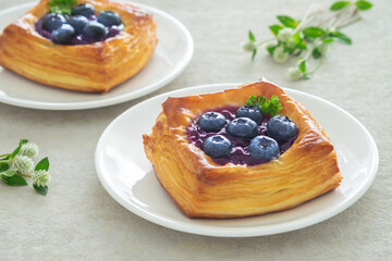 Blueberry danish puff pastry on white plate