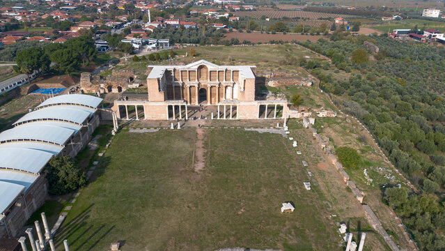 Aerial view with drone; Sardes (Sardis) Ancient City which has gymnasium and synagogue ruins and columns in Manisa, Turkey.
