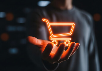Glowing shopping cart icon hovering over a persons hand