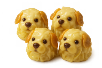 Puppy dog shaped steamed buns on transparent background, cute children's food for fun meals or pet celebration
