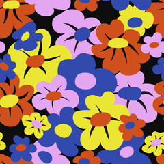 Playful seamless floral pattern featuring large, simplified retro-style flowers in vivid shades of yellow, blue, orange and pink on a black background. A bold, colorful and cheerful design.