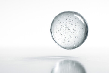 A transparent glass ball with bubbles in the air. Space for text.