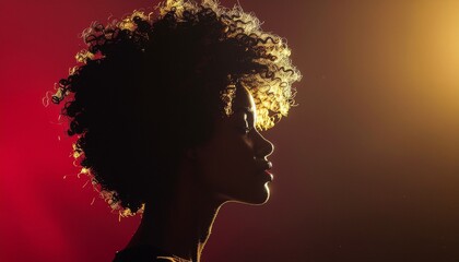 Crowd Silhouette Raising Clenched Fists in Unity Against the Golden Sunlight. Solidarity Symbol for Black Awareness Day.