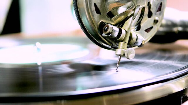 Vintage clockwork. The hands of an old master carefully adjust an antique clockwork, bringing it back to life. Restoration of antiques.