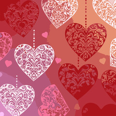 Ornate heart shapes with decorative floral patterns in red and white, hanging on a gradient background of pink and red. Romantic and elegant design for Valentines Day.