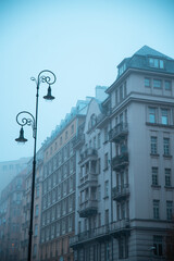 street in warsaw , city landscape evening autumn fog day