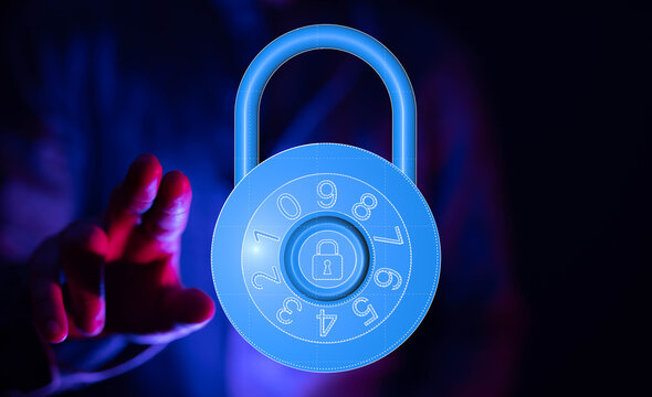 Hand reaching out to a digital padlock. Security, data protection, and privacy are key concepts in our digital