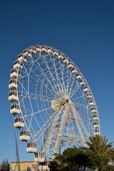 Ferris wheel. Observation. Ferris wheel with cabins for visitors. Attraction for viewing city from height. Gran Canaria. Canary Islands