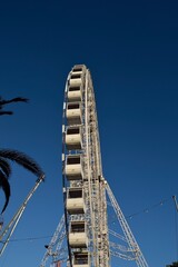 Ferris wheel. Observation. Ferris wheel with cabins for visitors. Attraction for viewing city from height. Gran Canaria. Canary Islands
