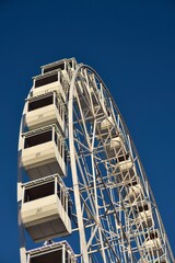 Ferris wheel. Observation. Ferris wheel with cabins for visitors. Attraction for viewing city from height. Gran Canaria. Canary Islands