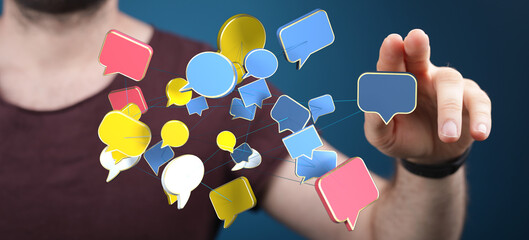 A close-up of a hand touching a digital chat bubble concept. Represents online communication, social media, and