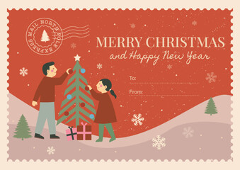 Vintage style Merry Christmas and Happy New Year vector postcard template with couple decorating a Christmas tree and postage stamp detail.