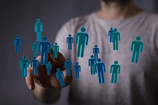 Concept of social network and communication. Digital human silhouettes and hand interacting in the future of te