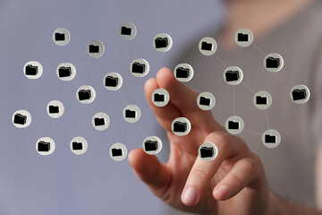 Hand interacting with digital network of data cloud computing technology, representing global connection, infor