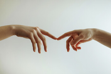 Two hands touch each other with their index fingers.