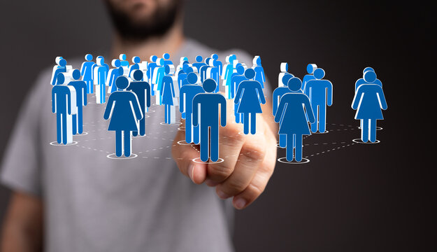 A hand touches a digital crowd of people, representing community, teamwork, and connectivity. Illustrates concepts such as unity and collaborati - Powered by Adobe