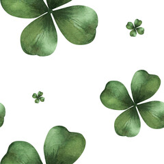 Seamless pattern of green four-leaf clovers for good luck. Hand painted delicate botanical illustration on a white background. Minimalist lucky charm design for St. Patrick's Day and wallpaper.