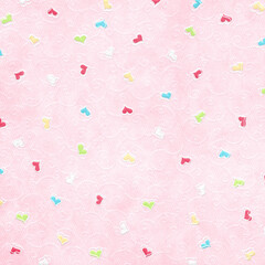 Seamless pink paper texture with scattered pastel candy hearts and subtle embossed swirls—cute romantic background for Valentine, baby shower, nursery, wrapping paper, fabric, scrapbooking.