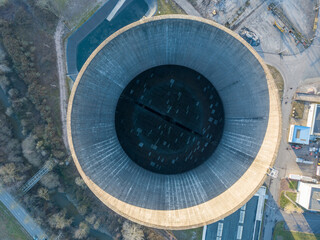 Aerial Top View of Abandoned Cooling Tower at Decommissioned Power Plant