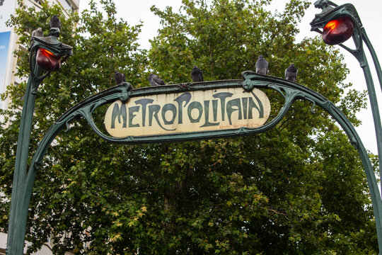 Paris, France - July 17, 2011: The Parisian Metro Sign, Metropolitan, original by the architect Hector Guimard