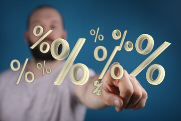 Image of a man's hand pointing at floating percent symbols. Perfect for financial, business, and data analysis concepts.