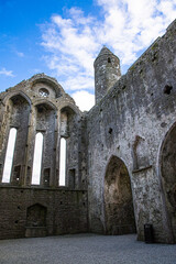 Inside the Castle the Rock of Cashel or Cashel of the Kings and St. Patrick Rock at Cashel, Ireland. Blue sunny sky. 