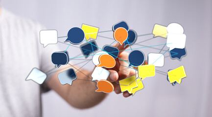Hand holding interconnected speech bubbles representing communication, networking, digital interaction, social