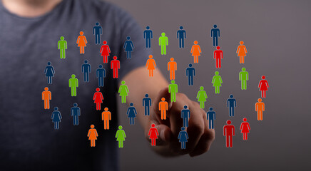 Hand pointing at colorful people icons, representing social networking, teamwork and community. Ideal for business, marketing, or social media t