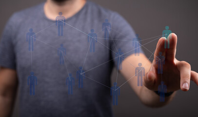 Close-up of a hand interacting with a digital network, representing concepts like connection, community, and te