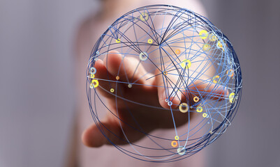 Abstract conceptual image depicting global network connections. A hand reaches towards a digital globe illustrating communication, te