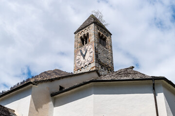 View of the parish church of San Martino located in Olivone, a hamlet of Blenio in the canton of Ticino, Switzerland.