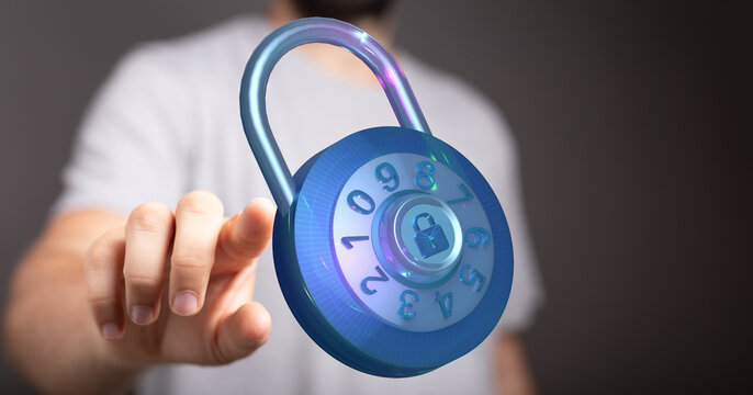 Hand pressing padlock representing digital security and protection of data with a glowing interface on a blurre