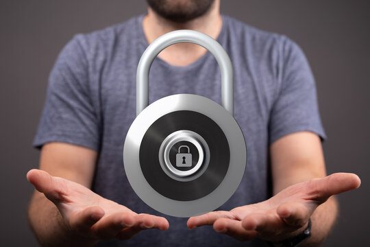 Image of a man with open hands presenting a large padlock, symbolizing security, privacy, and protection in the