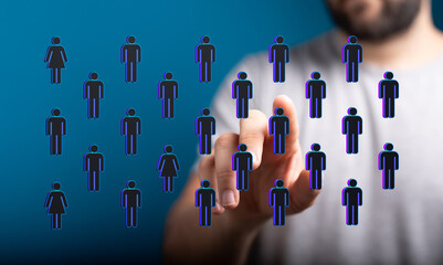 A hand touching digital icons of people, representing selection, community, and the power of...