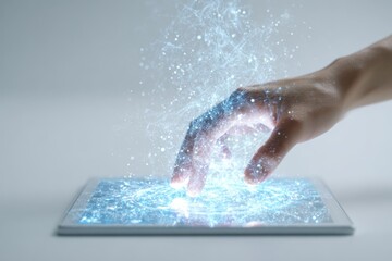 Digital Interaction: A hand interacts with a tablet device, sparking a stream of digital particles that cascade in an artistic display of technology.
