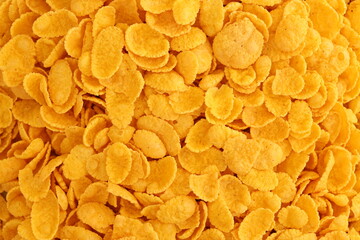 Corn flakes background texture close up. Top view cornflake cereal box for morning breakfast
