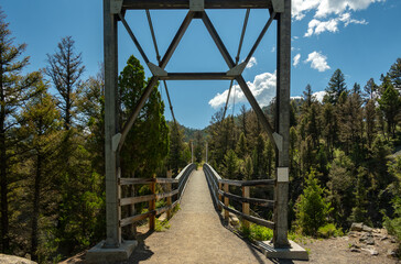 Framed View Of Hellroaring Suspension Bridge In Yellowstone
