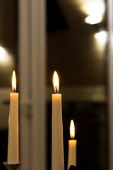 Cozy atmosphere. Candle Fire Close-Up