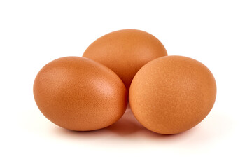 Three Brown Eggs, isolated on white background