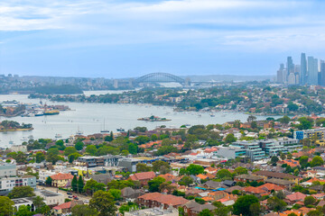 Drone aerial photograph looking towards Sydney Harbour and the Sydney Harbour Bridge in the city of Sydney in NSW, Australia.