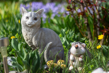 Garden decoration. Cat and hedgehog model