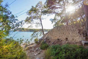 Hiking in Turkey: Lycian Way, coastal hike on the Turkish Riviera with beautiful views. Phaselis antique archaeological site in Turkey Kemer Antalya