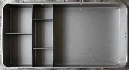 Empty first aid kit on gray background, storage container for medical supplies, copy space