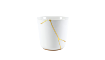 White kintsugi cup with gold repair isolated on transparent background