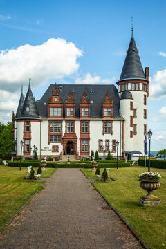 Klink, Germany - 27 June 2025: Klink Castle, a Luxury Resort Hotel at the Mueritz Lake on a perfectly sunny Summer Day