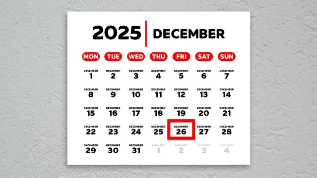 The date December 26th marked with a red cursor on the wall calendar 2025